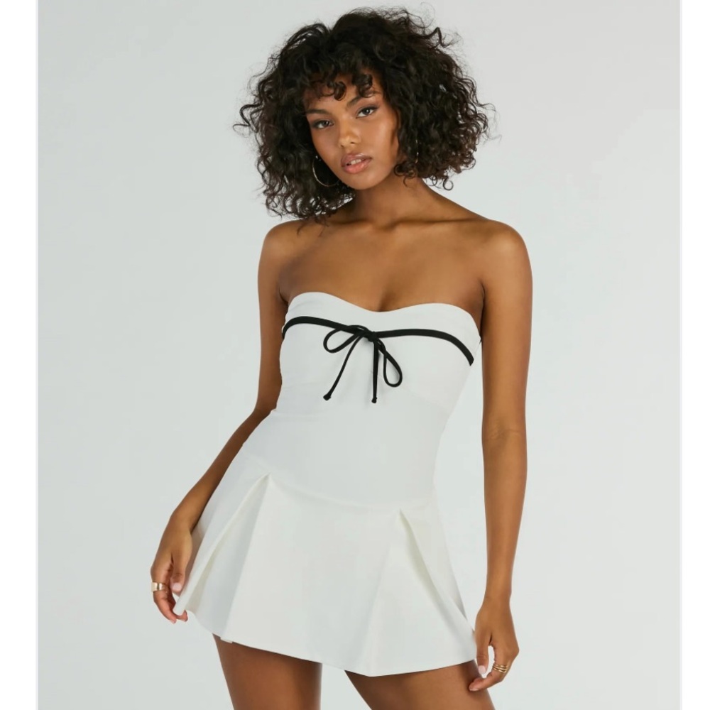 Strapless white mini dress with bow details and skort. New with tag.